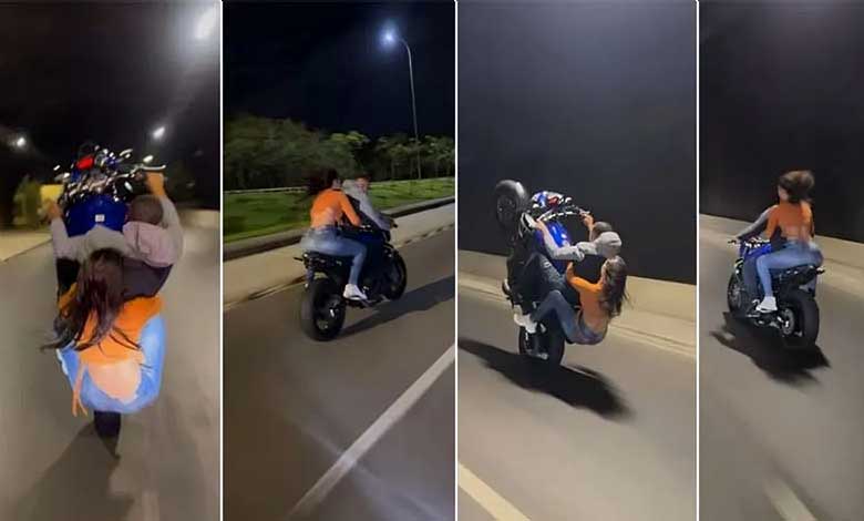 گرل فرینڈ کے ساتھ نوجوان کا خطرناک بائیک اسٹنٹ، لڑکی خوفزدہ ہونے کے بجائے انجوائے کرتی رہی (ویڈیو)