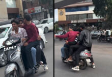 لکڑی کا پل کے قریب ایک اسکوٹر پر پانچ افراد کا خطرناک سفر
